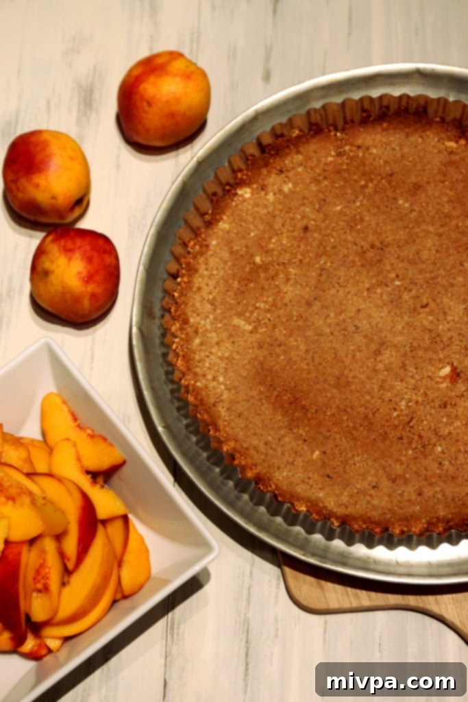 Serving a Delicious Honey Peach Ricotta Tart with Almond Crust