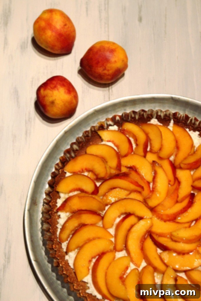 Delicious Honey Peach Ricotta Tart with Almond Crust Ready to Serve
