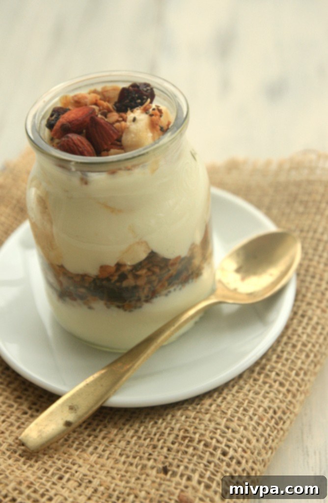 Final shot of Gluten-Free Almond Granola in a jar, ready for storage