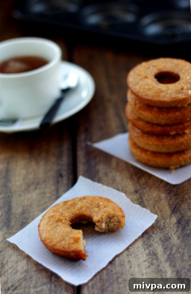 Artfully arranged Grain-free Apple Cider Vinegar Doughnuts with jam