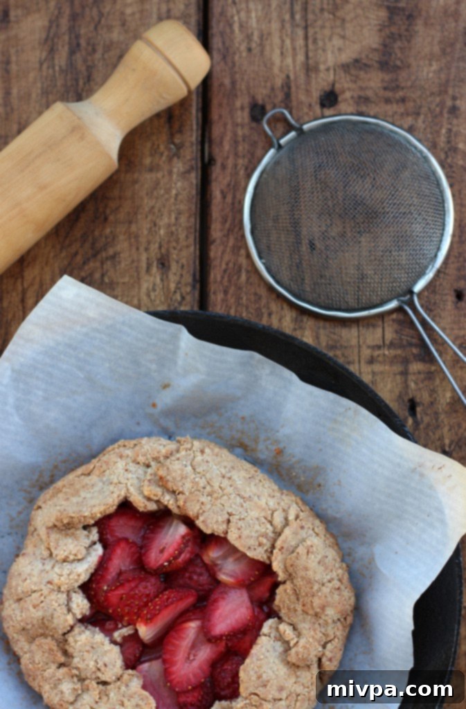 Grain-free Strawberry Almond Galette with a scoop of ice cream