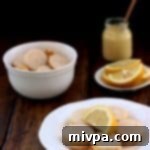 Grain-Free Lemon Sandwich Cookies recipe card image.
