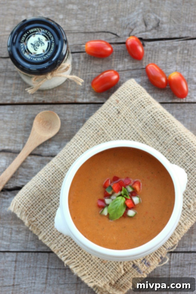 Close-up of freshly prepared Tomato & Bell Pepper Gazpacho.