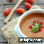 Vibrant Tomato and Bell Pepper Gazpacho 8 Tomato & Bell Pepper Gazpacho recipe card image.