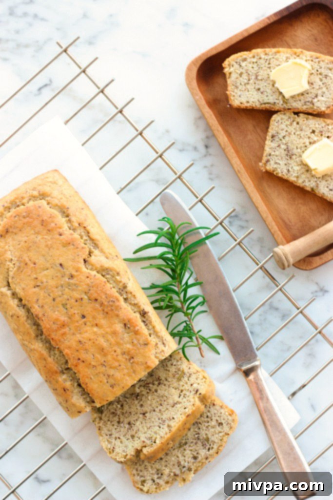 Grain-free Rosemary Almond Bread on a wooden board