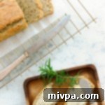 Grain-free Rosemary Almond Bread sliced on a plate