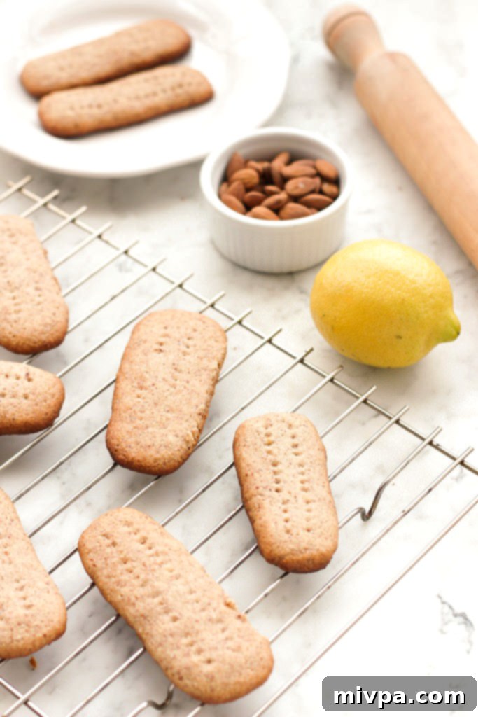 Grain-free honey lemon shortbread cookies on wire rack.
