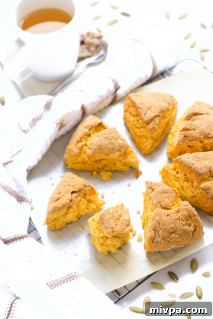 Scones on parchment-lined cooling rack.