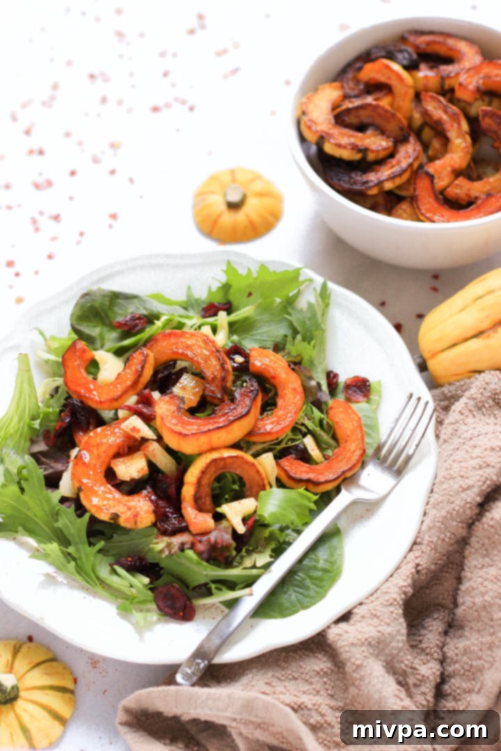 Roasted Delicata Squash Salad (Gluten-Free, Vegan) Up close shot of a plate of delicata squash salad.