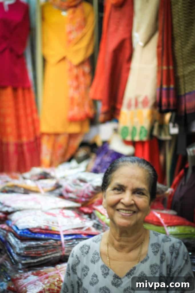 Little India - Leela, the shopkeeper, smiling