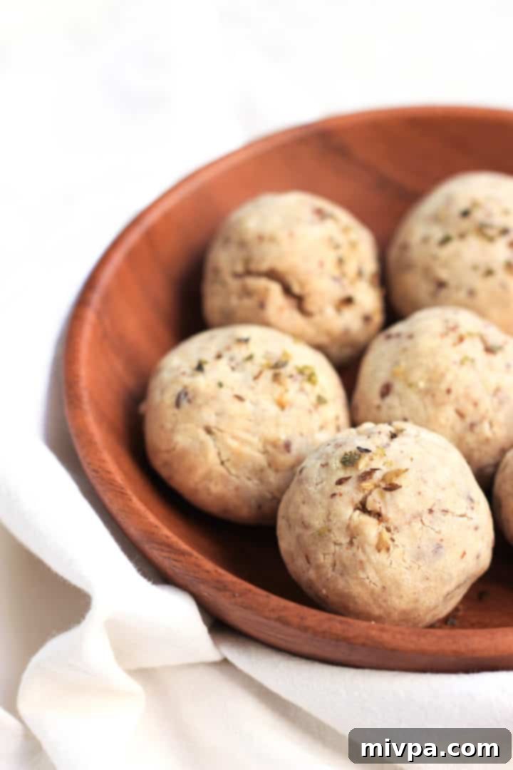 Deliciously baked gluten-free, egg-free, and dairy-free bread rolls, fresh from the oven, golden brown and perfectly rounded.