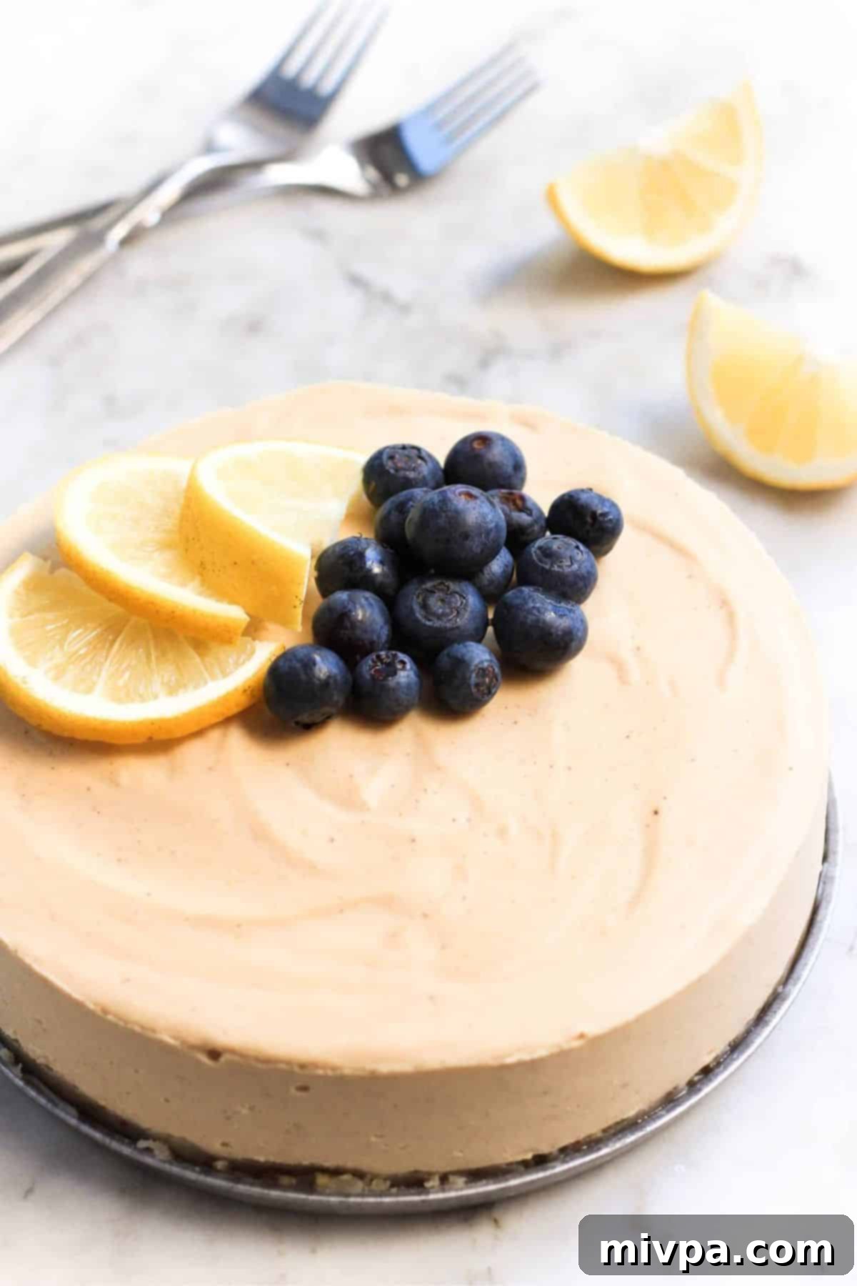 Up close view of a gluten-free dairy-free lemon cheesecake.