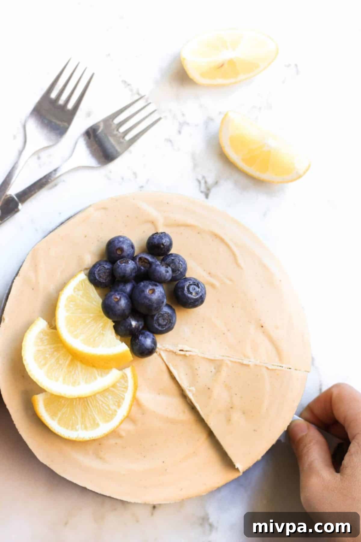 Reaching for a slice of no-bake gluten-free lemon cheesecake.