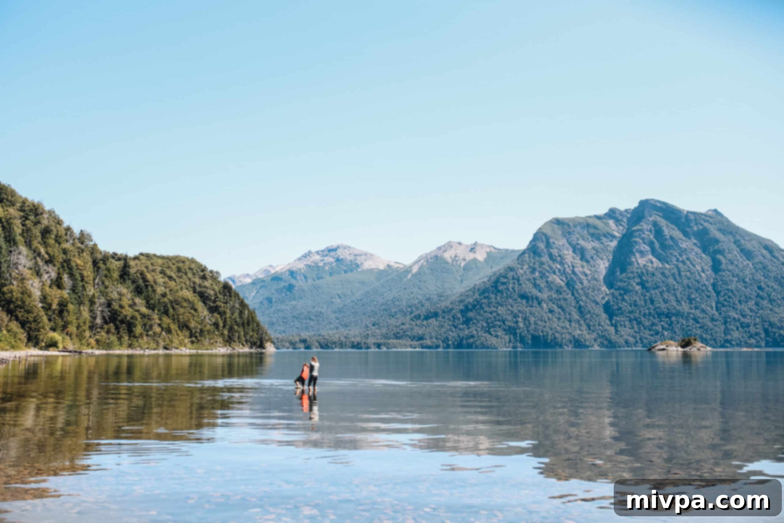 Reflections of mountains in the calm lake waters