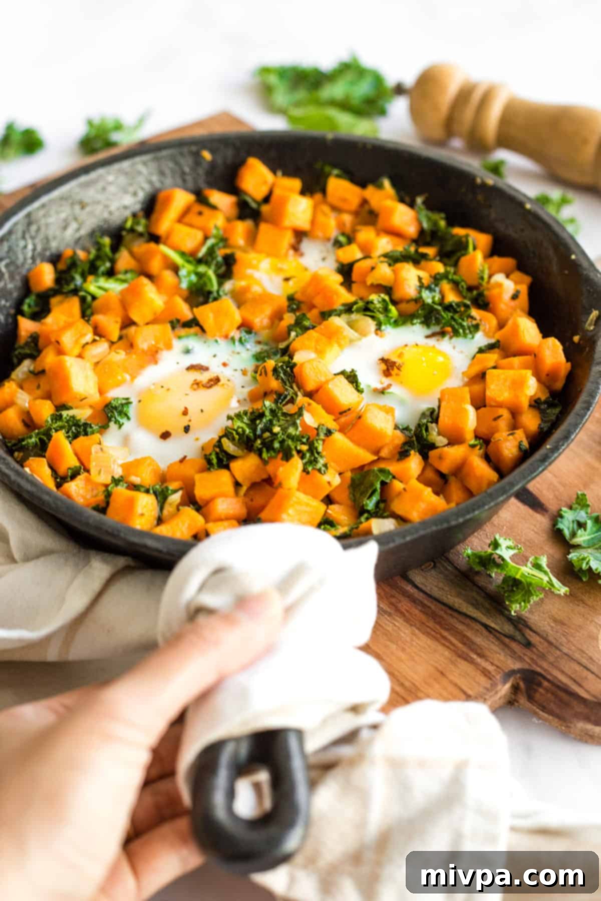 A delicious Sweet Potato & Kale Breakfast Skillet, ready to be served.