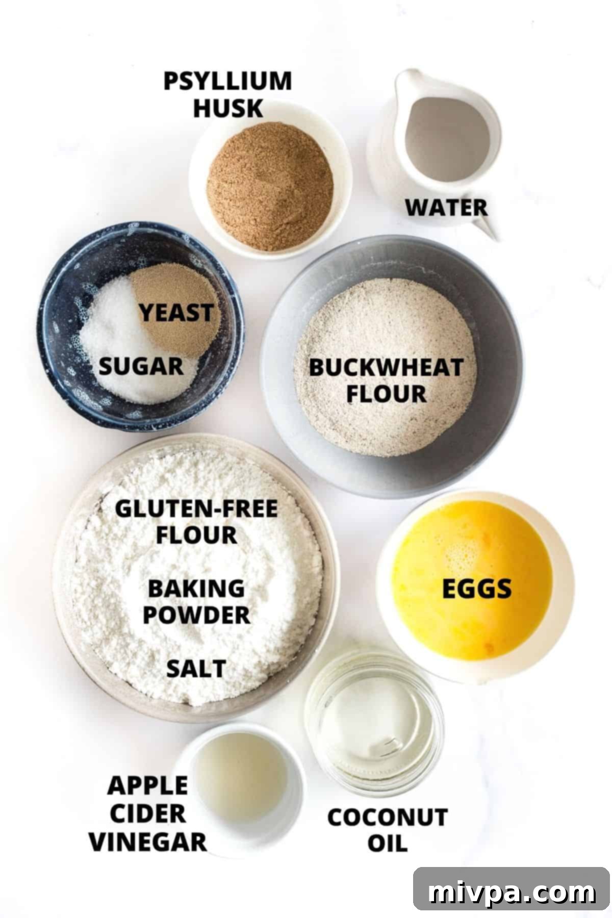 Ingredients for buckwheat bread laid out on a marble board.