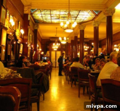 The opulent interior of Cafe Tortoni, showcasing its traditional Porteño charm and classic decor.
