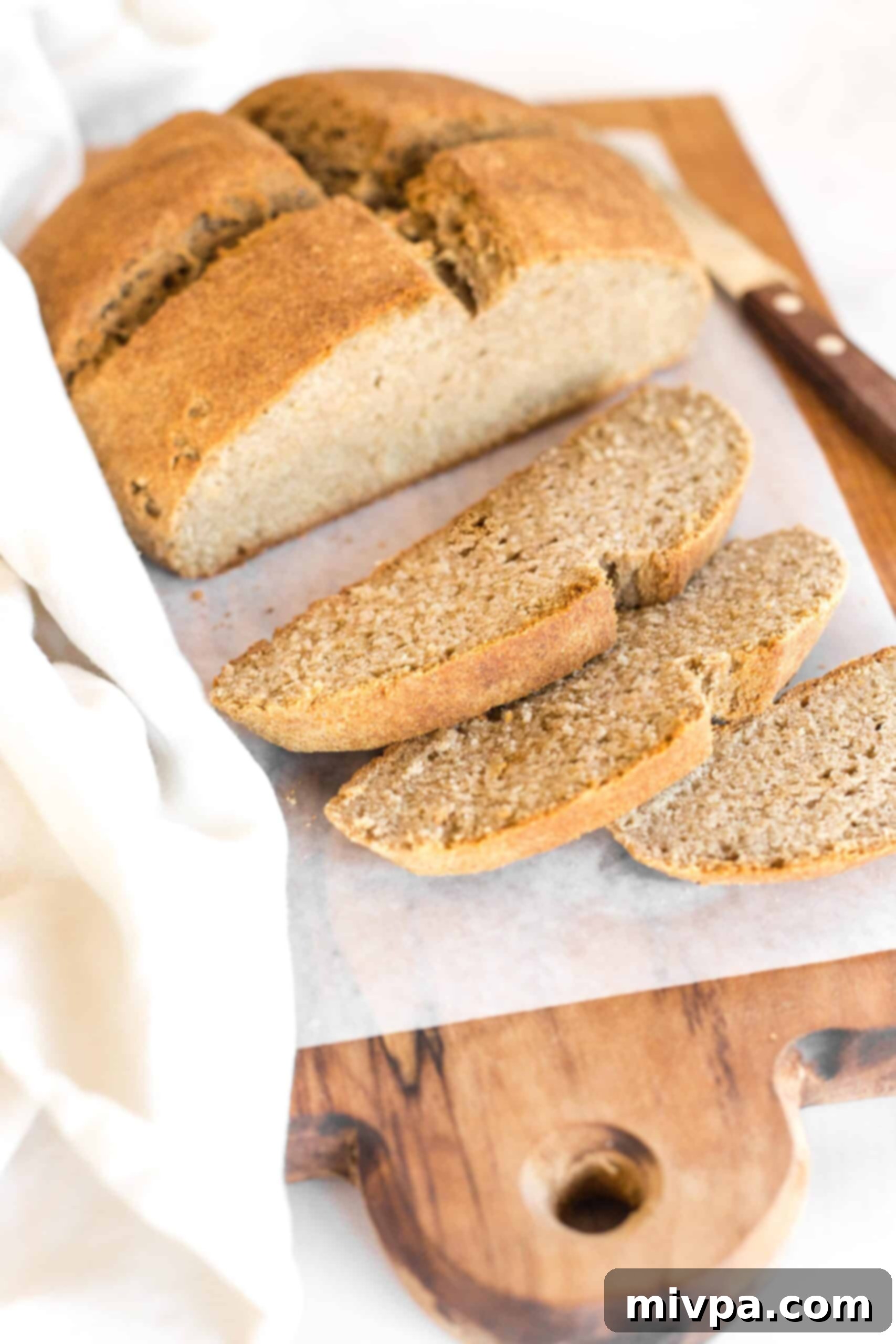 Slices of Irish brown bread on parchment paper.