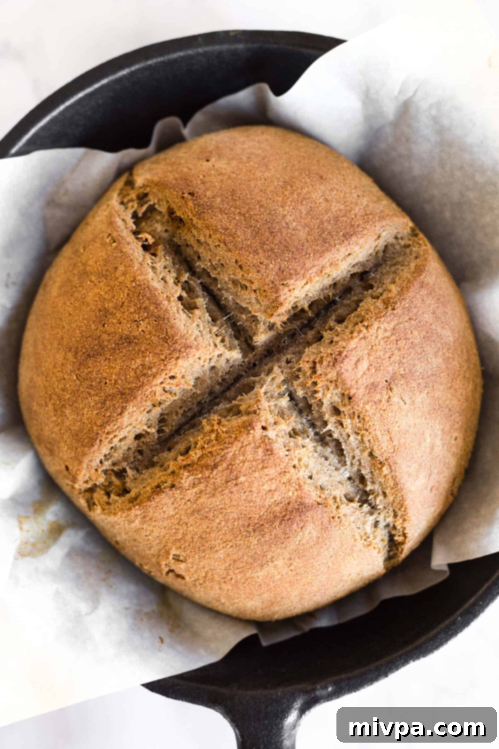 Freshly baked Irish brown bread in cast iron skillet