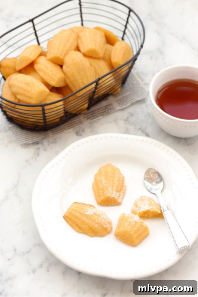 Gluten-free Cornbread Madeleines arranged beautifully on a marble board, ready to be enjoyed.