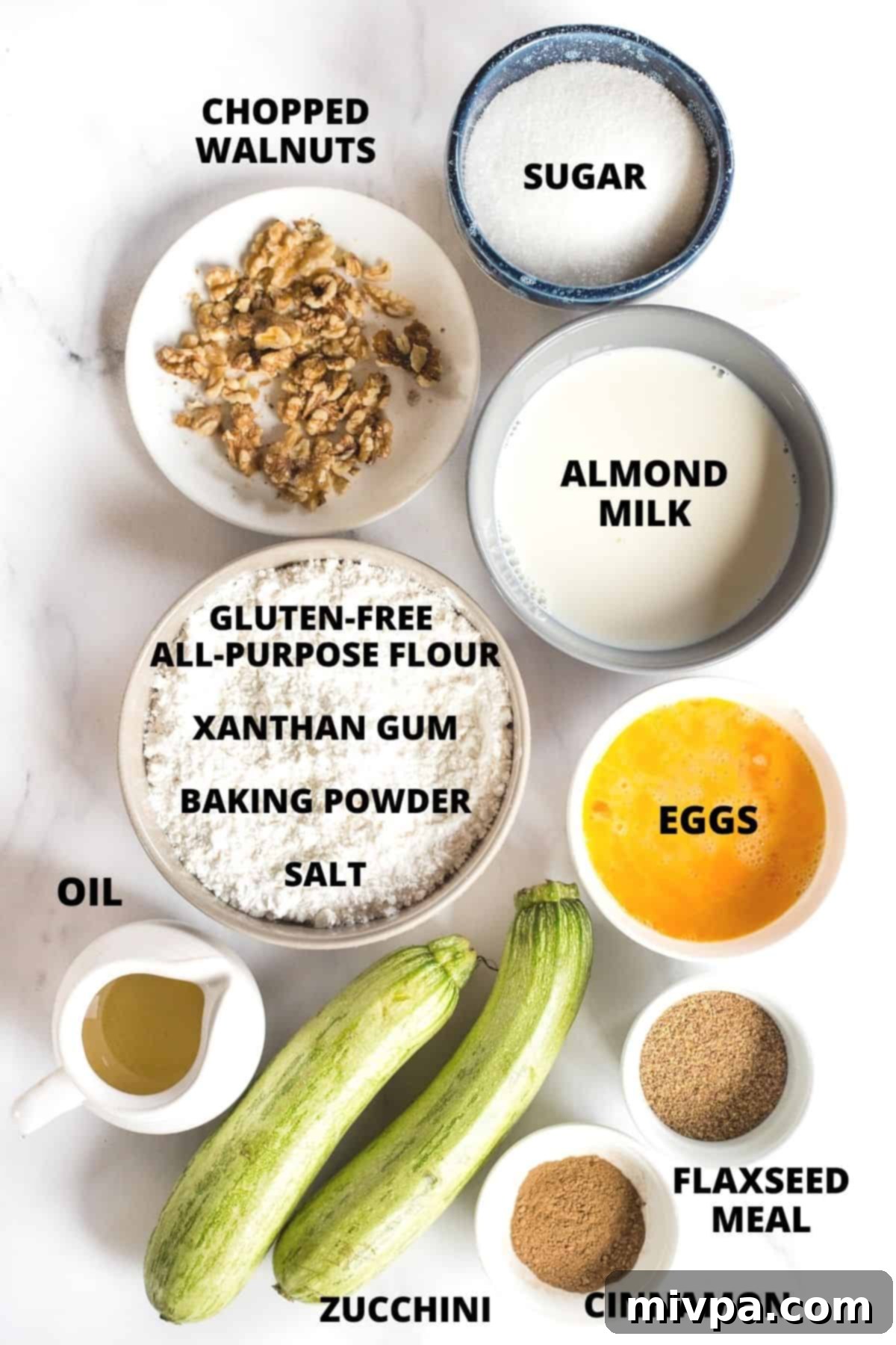 An organized display of all the essential ingredients needed for the gluten-free dairy-free zucchini bread recipe.