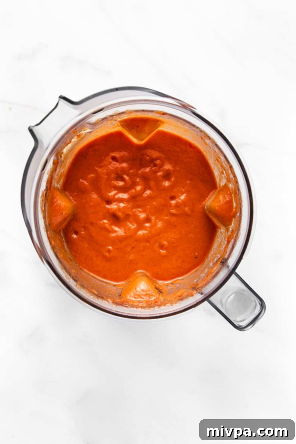 Pureed tomato mixture in blender.