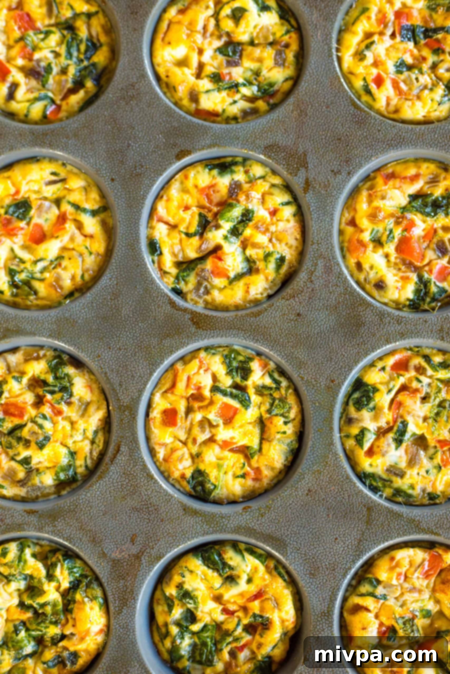Mini Crustless Quiches (Gluten-Free, Dairy-Free) Freshly baked mini crustless quiches in silicon muffin mold.