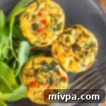 Simple Gluten Free Dairy Free Mini Crustless Quiche 2 Top down view of mini crustless quiches on plate