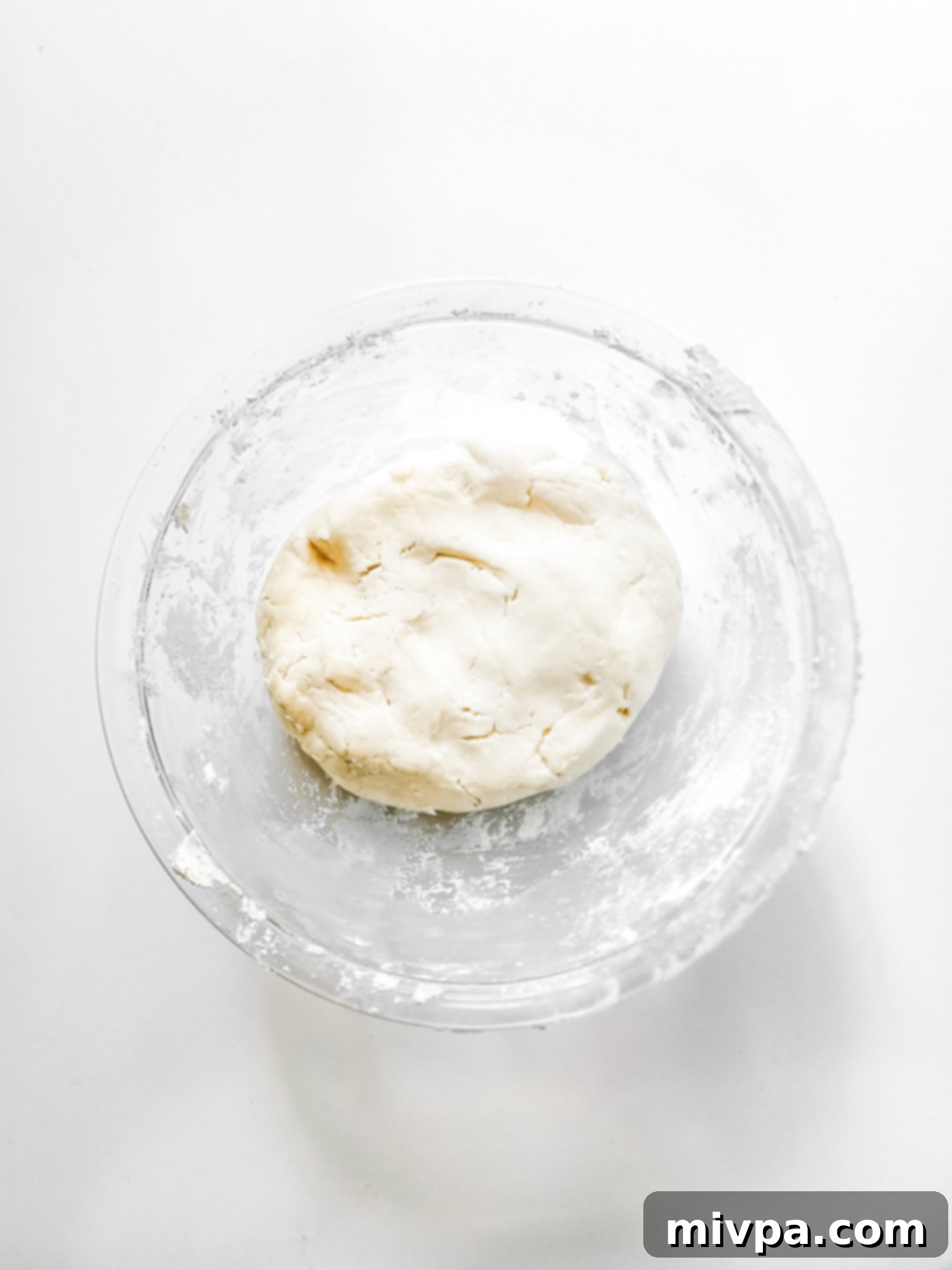 Peppermint filling dough in a large mixing bowl, showing its soft, malleable texture.