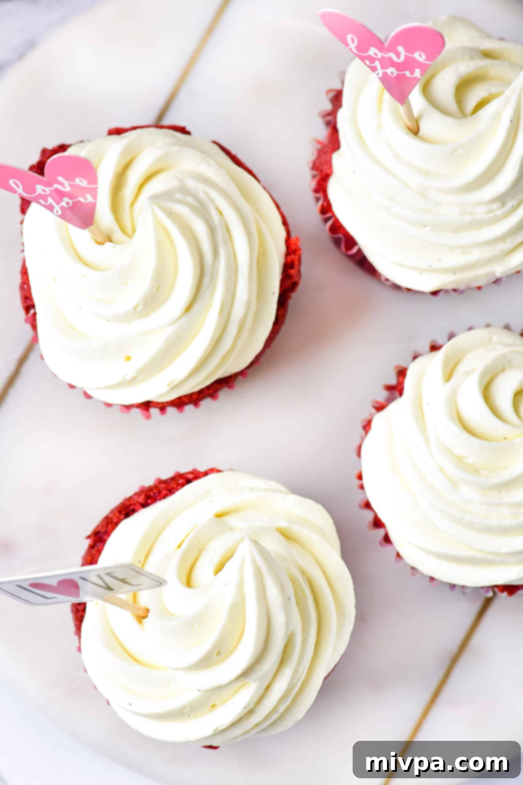 Top down view of classic red velvet cupcakes.