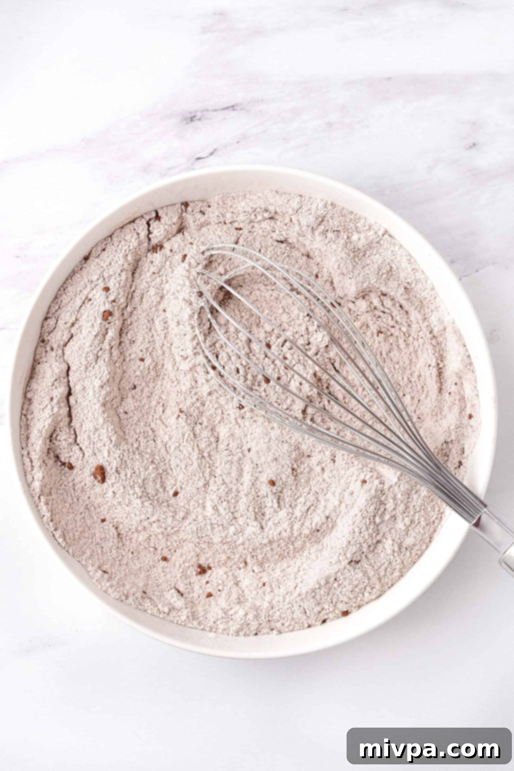 Dry ingredients in a large mixing bowl.