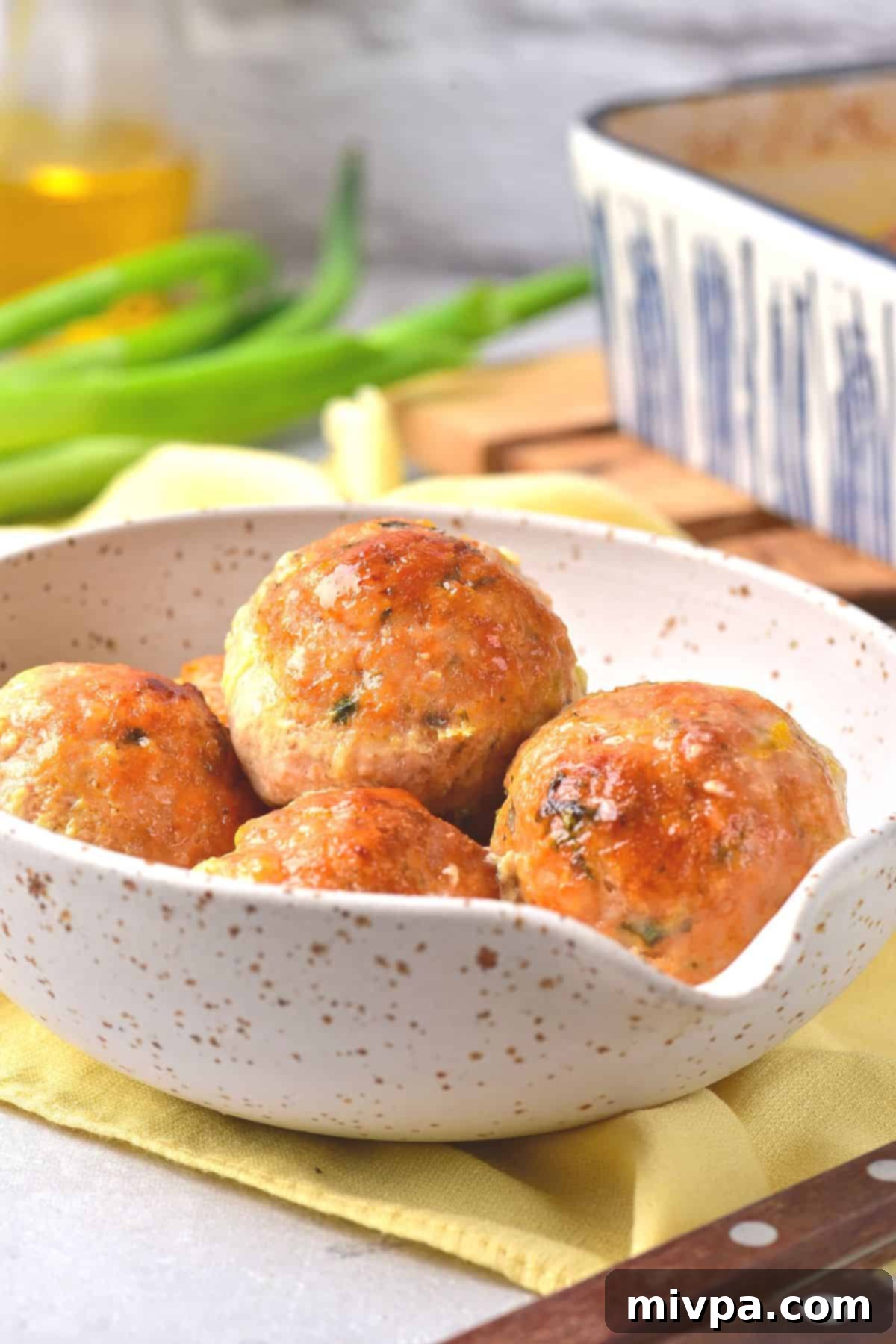 Up close shot of chicken balls in a bowl.
