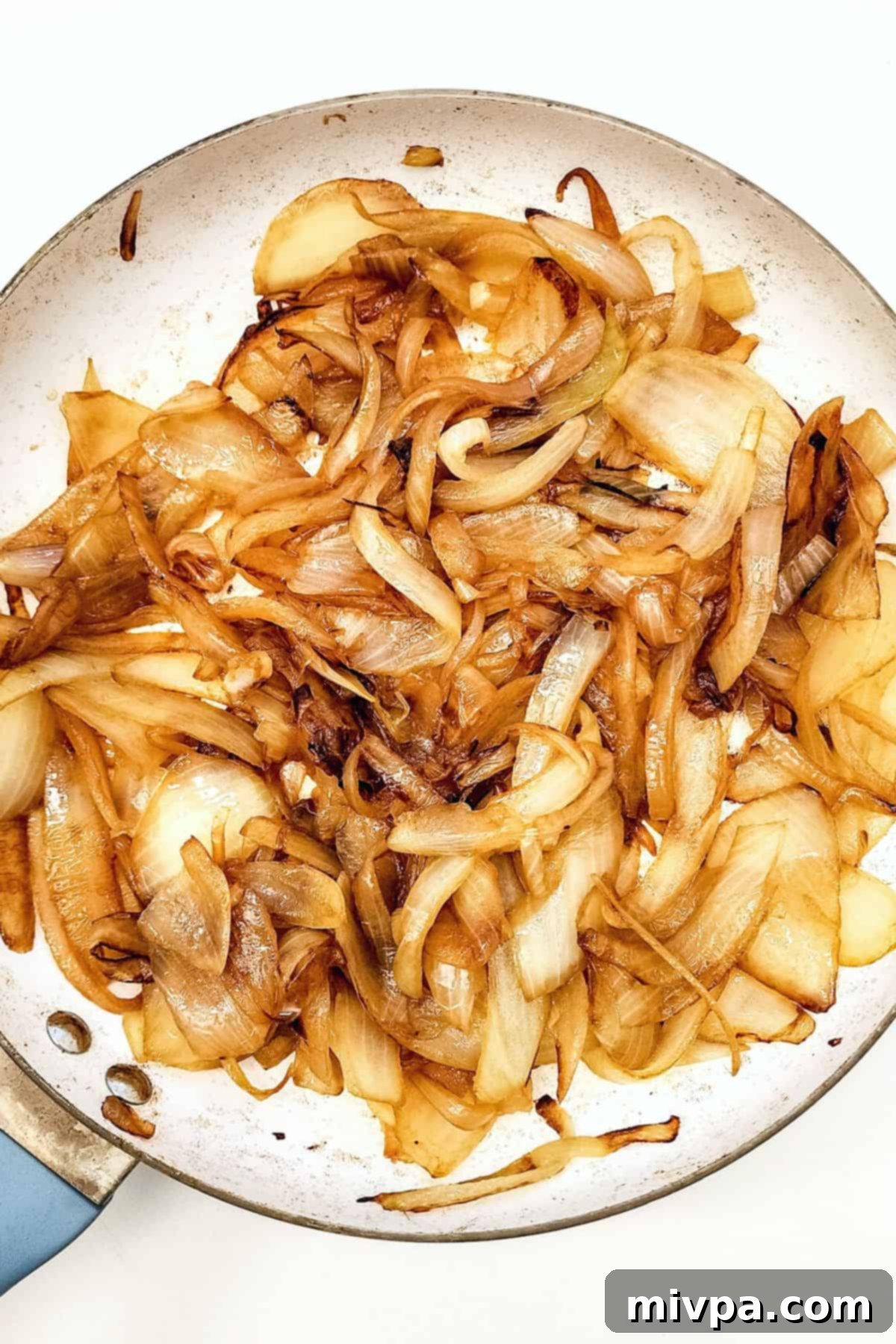 Caramelized onions in a large skillet.