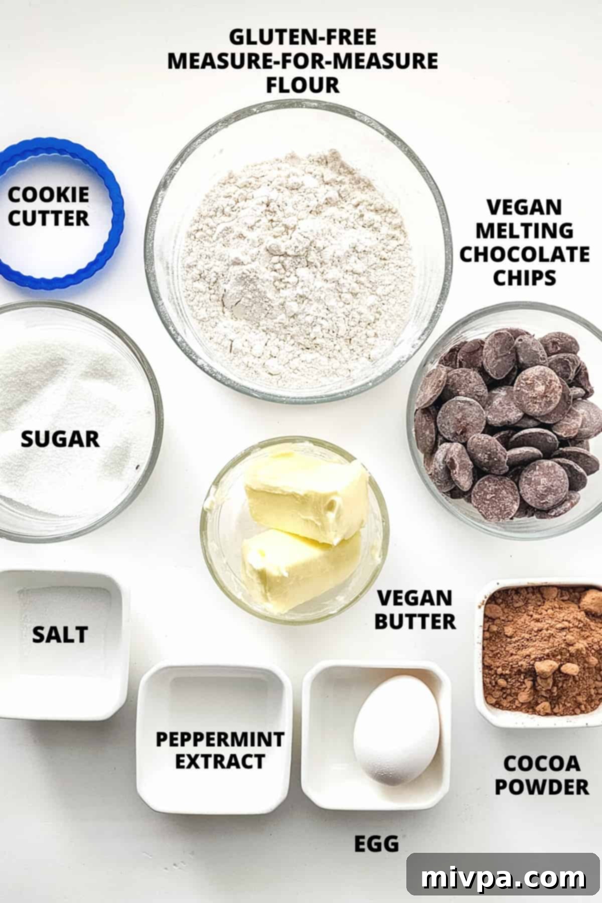 Ingredients for gluten-free thin mints recipe laid out on white board.