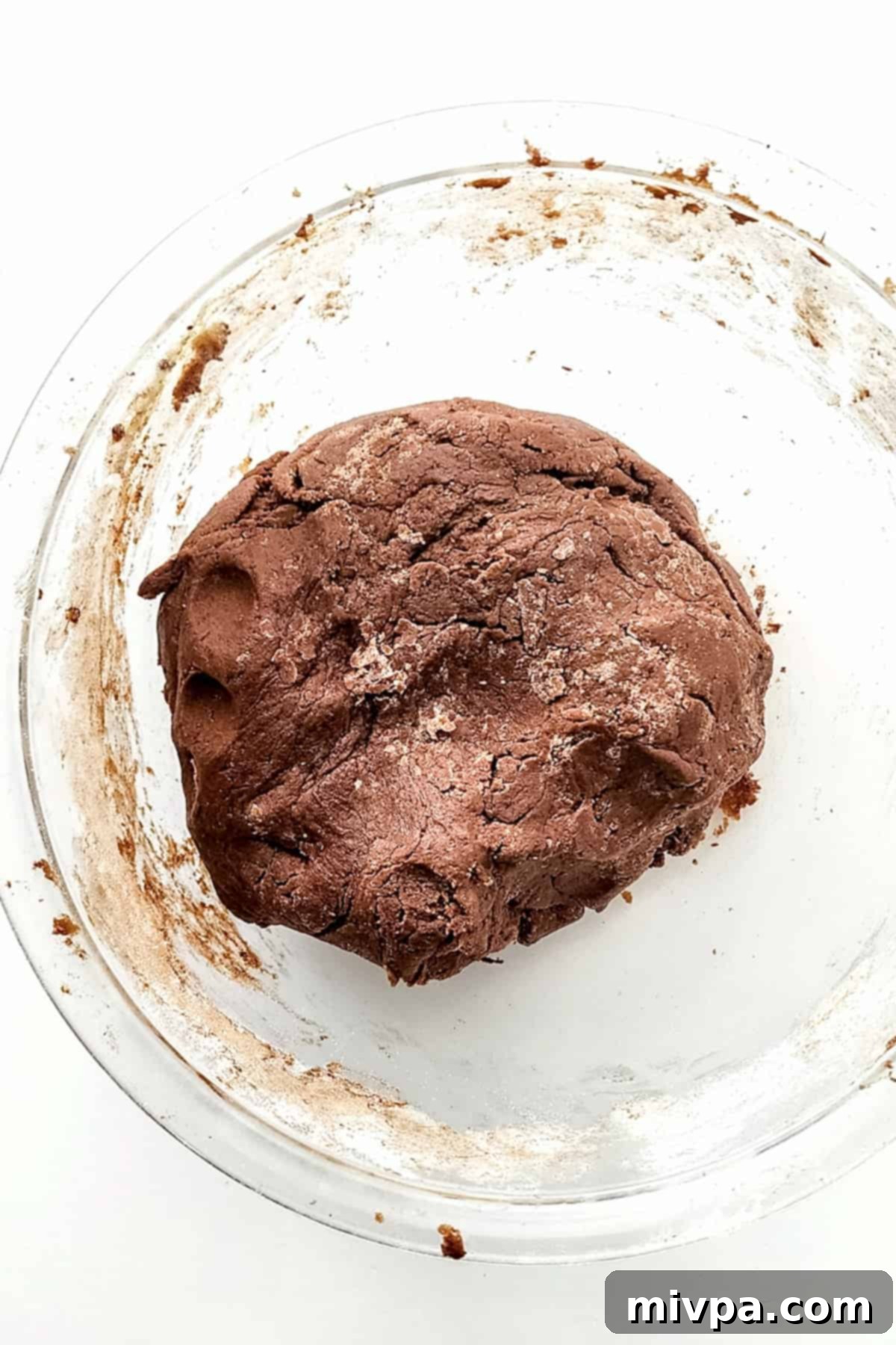 Dairy-free thin mint cookie dough in glass bowl.