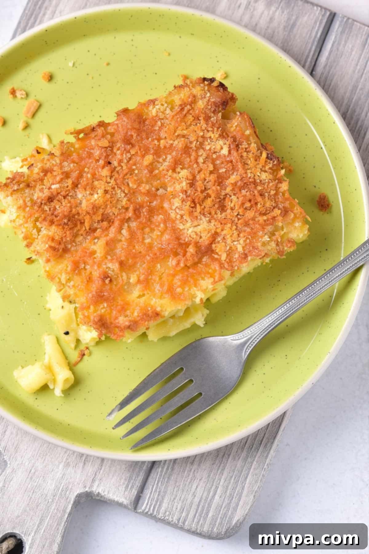 Top down view of a portion of gluten-free macaroni cheese.