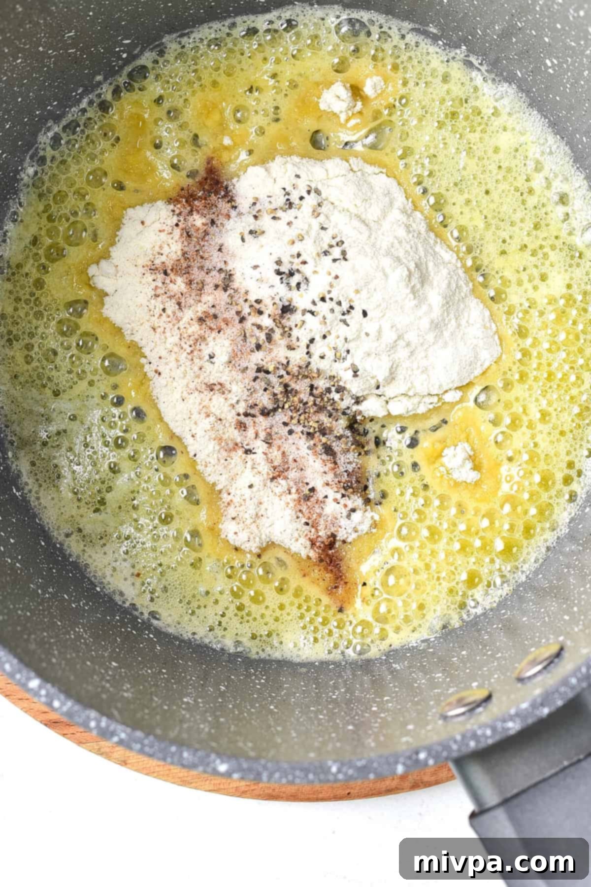 Melted butter, flour and spices in a pan.