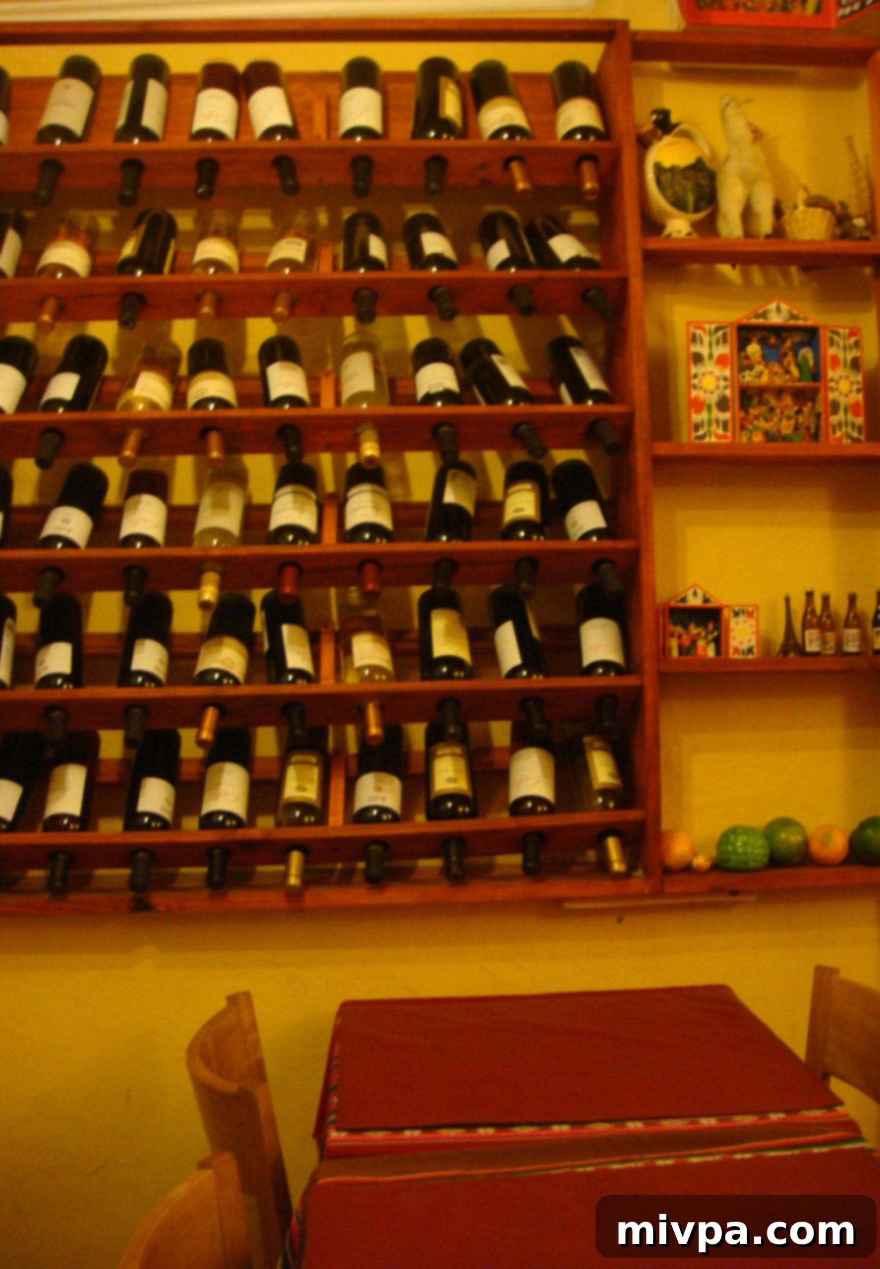 A selection of wines displayed at Primavera Trujillana, suggesting a good pairing for Peruvian dishes.
