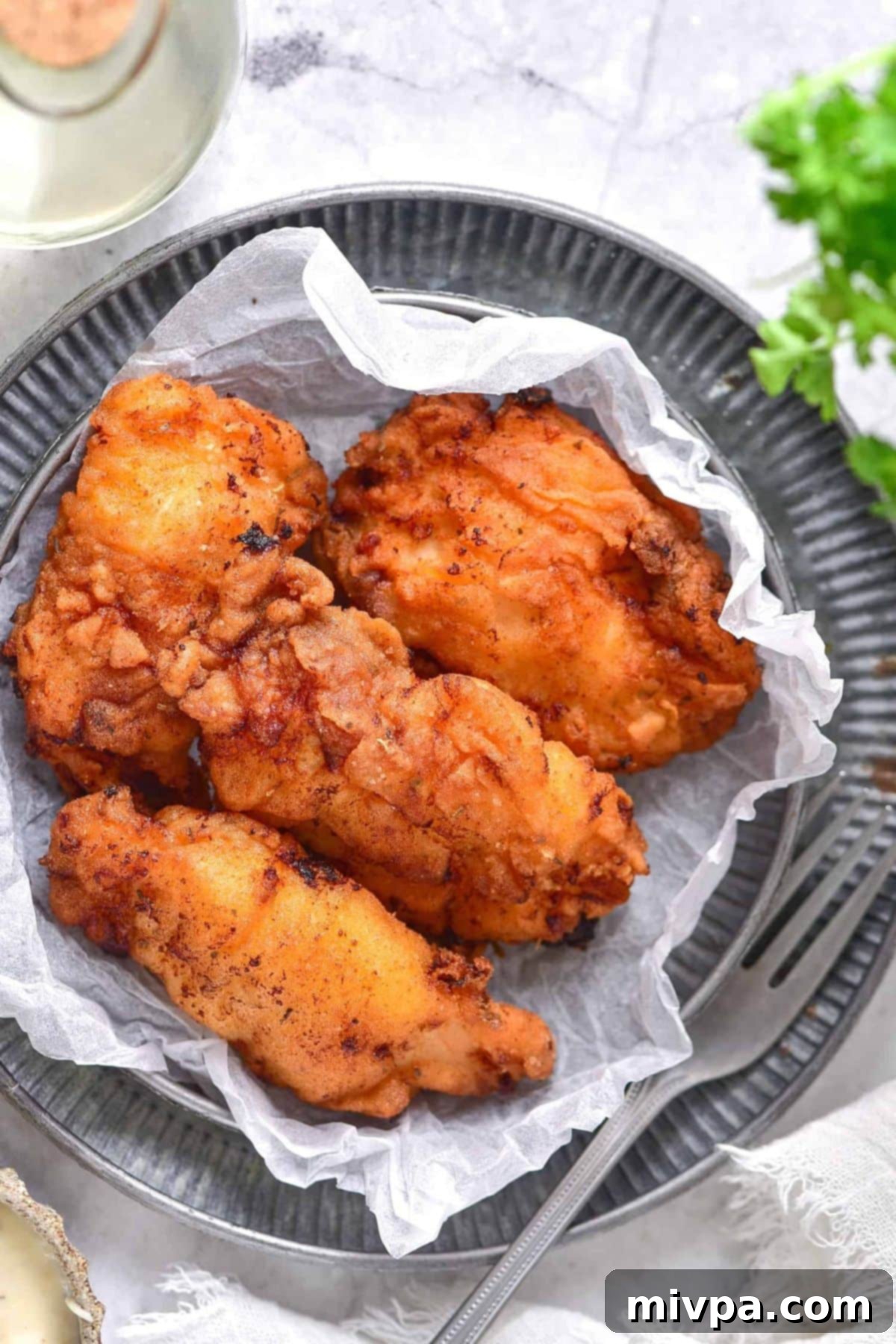 Gluten and Dairy Free Fried Chicken Recipe A beautifully presented plate of gluten and dairy-free fried chicken, ready to be enjoyed.