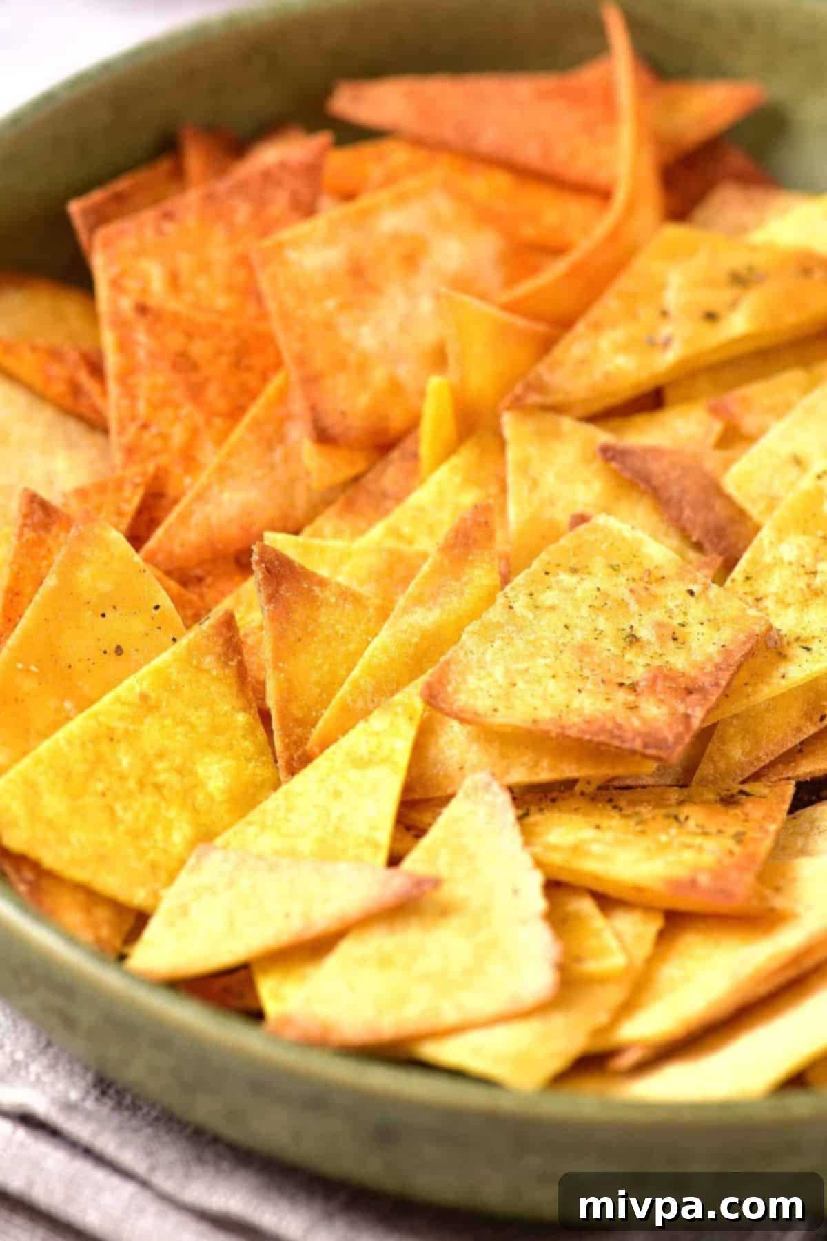 A bowl of homemade corn chips (gluten-free).