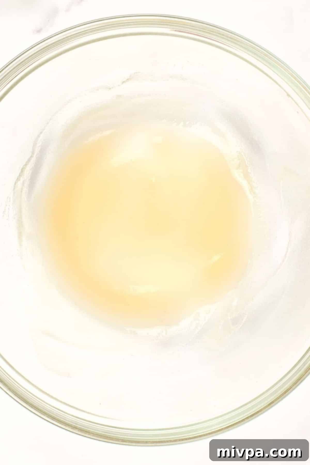 Strawberry Panna Cotta Recipe (Gluten-Free, Vegan) Agar agar mixture in glass bowl.