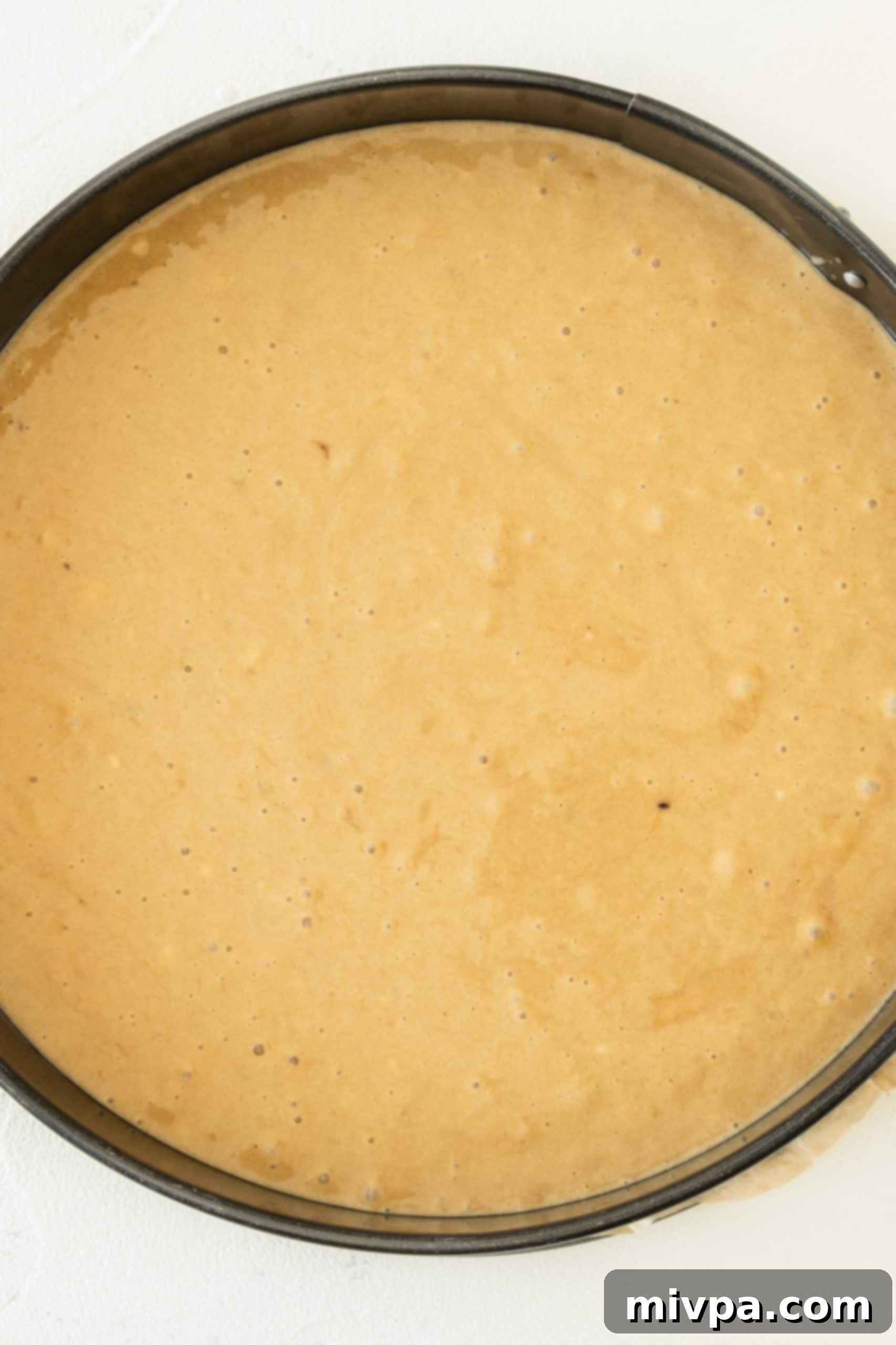 Easy Gluten-Free Banana Cake (Dairy-Free) Gluten-free banana cake batter in cake pan.