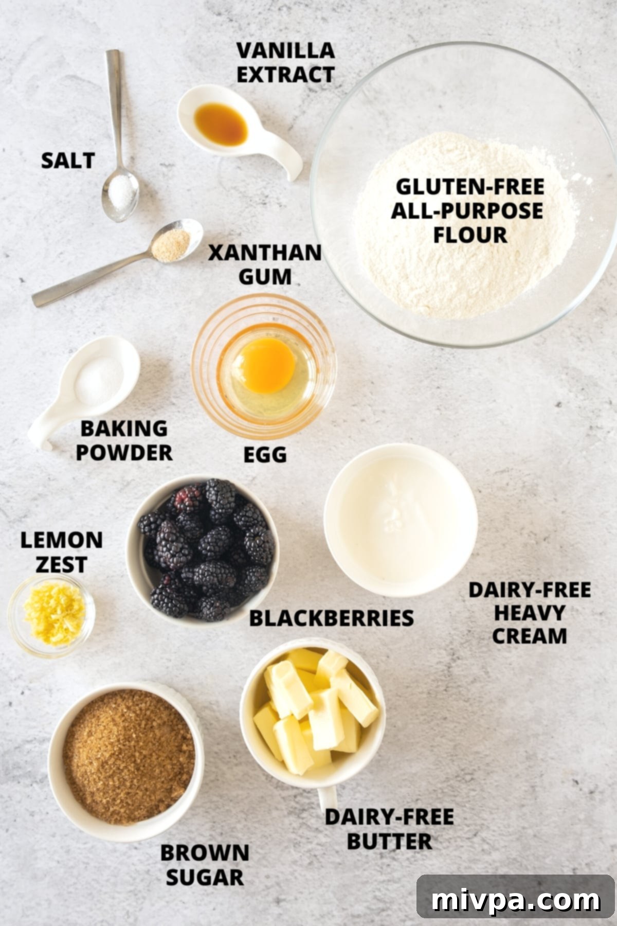 Gluten-Free Blackberry Scones (Dairy-Free) Ingredients All ingredients for gluten-free blackberry scones recipe neatly laid out on a wooden board.