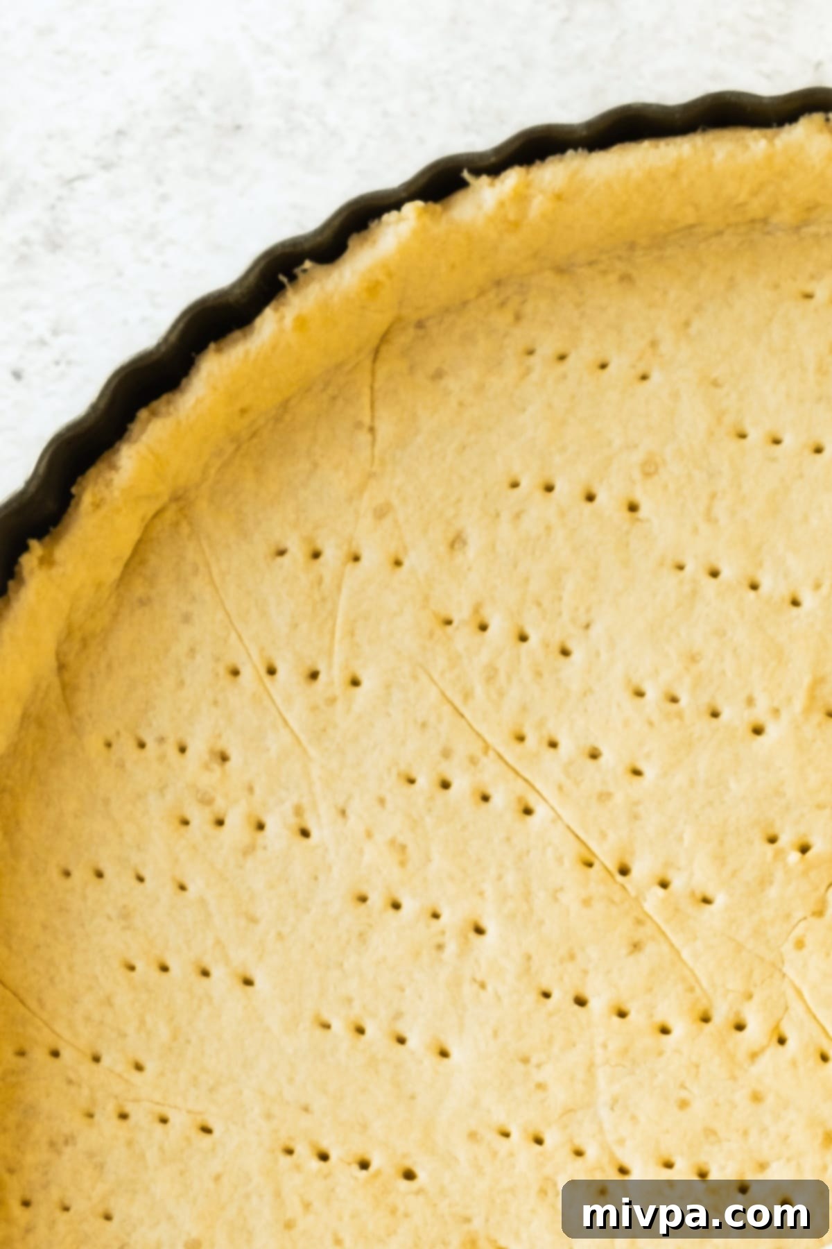 Gluten Free Dairy Free Apple Tart Baked tart crust ready for filling.