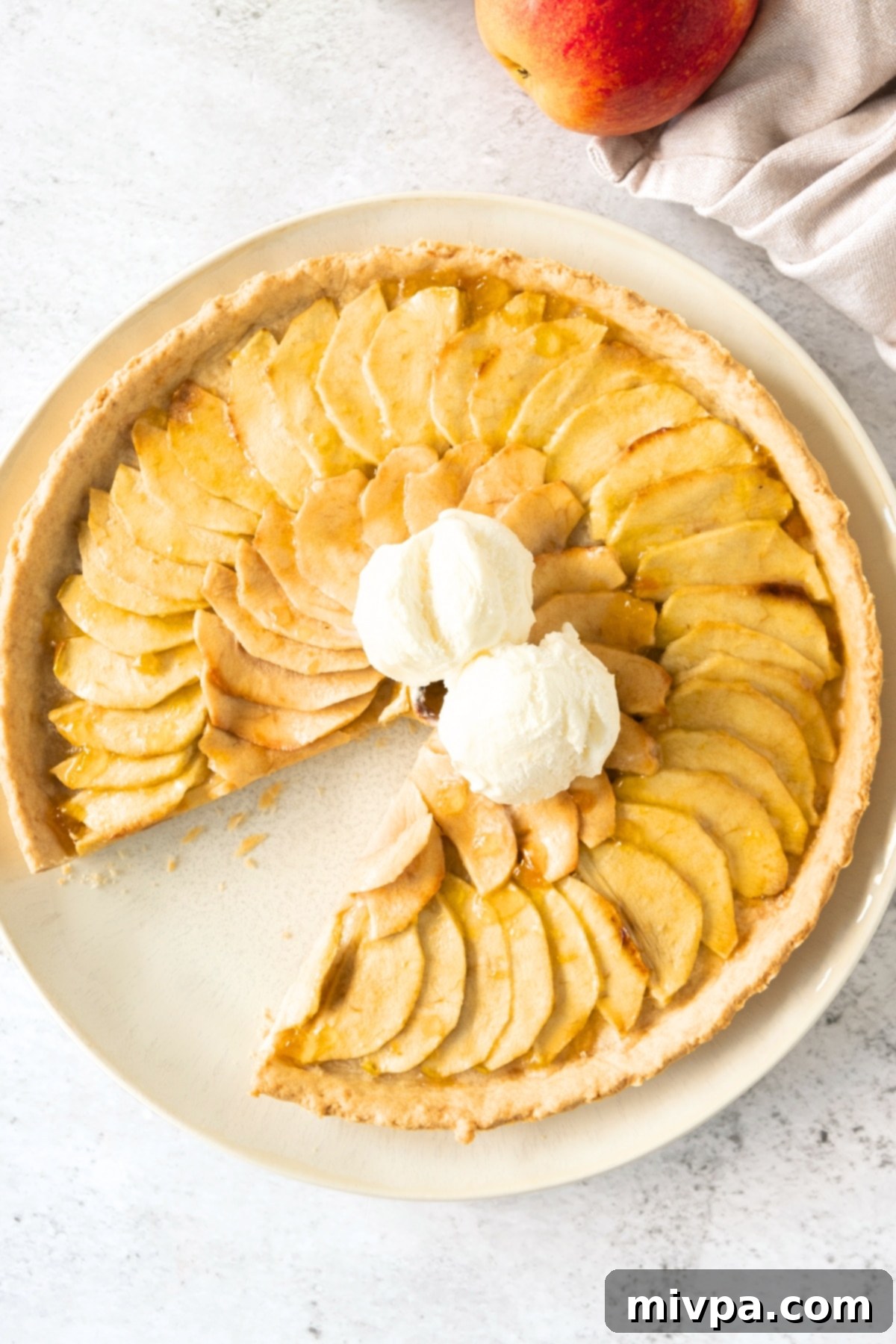 Gluten-Free French Apple Tart (Dairy-Free) A half-eaten gluten-free French apple tart.