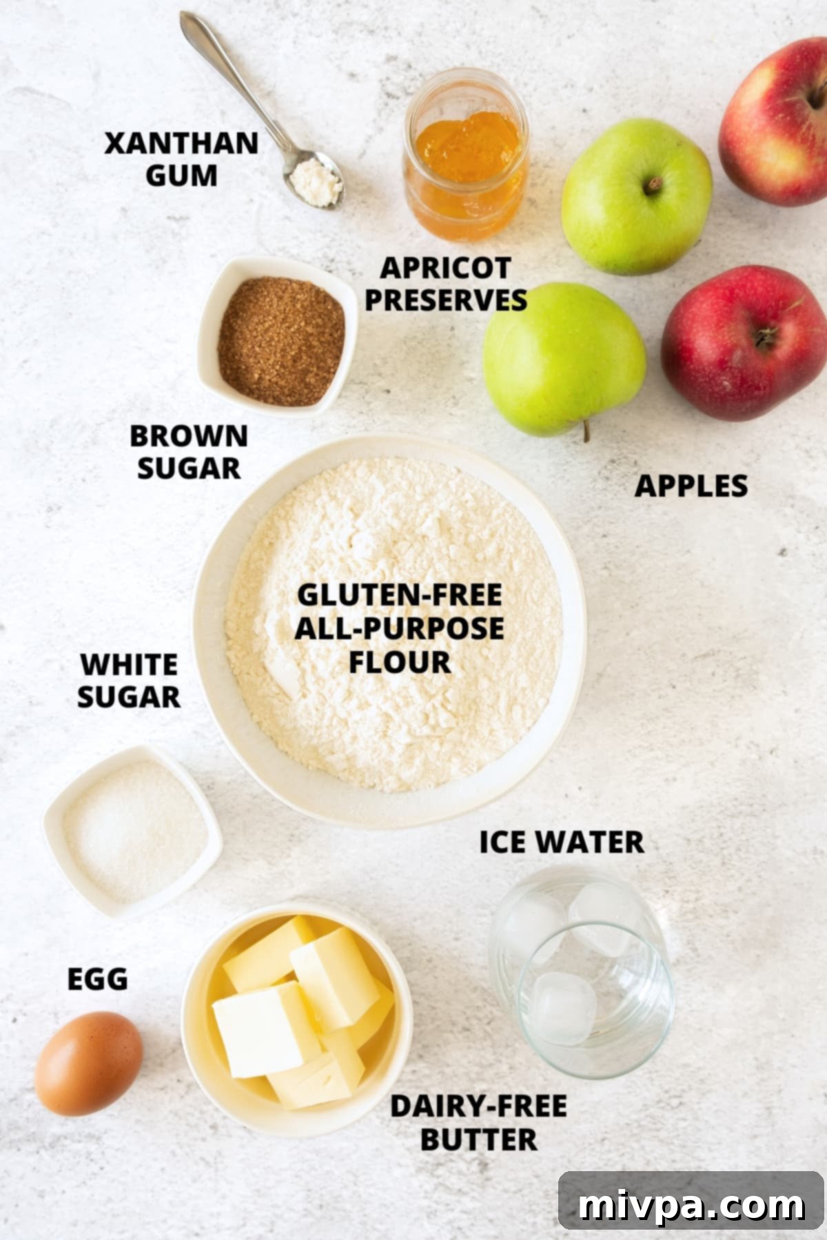 Gluten-Free Apple Tart Recipe (Dairy-Free) Ingredients for gluten-free apple tart laid out on board.
