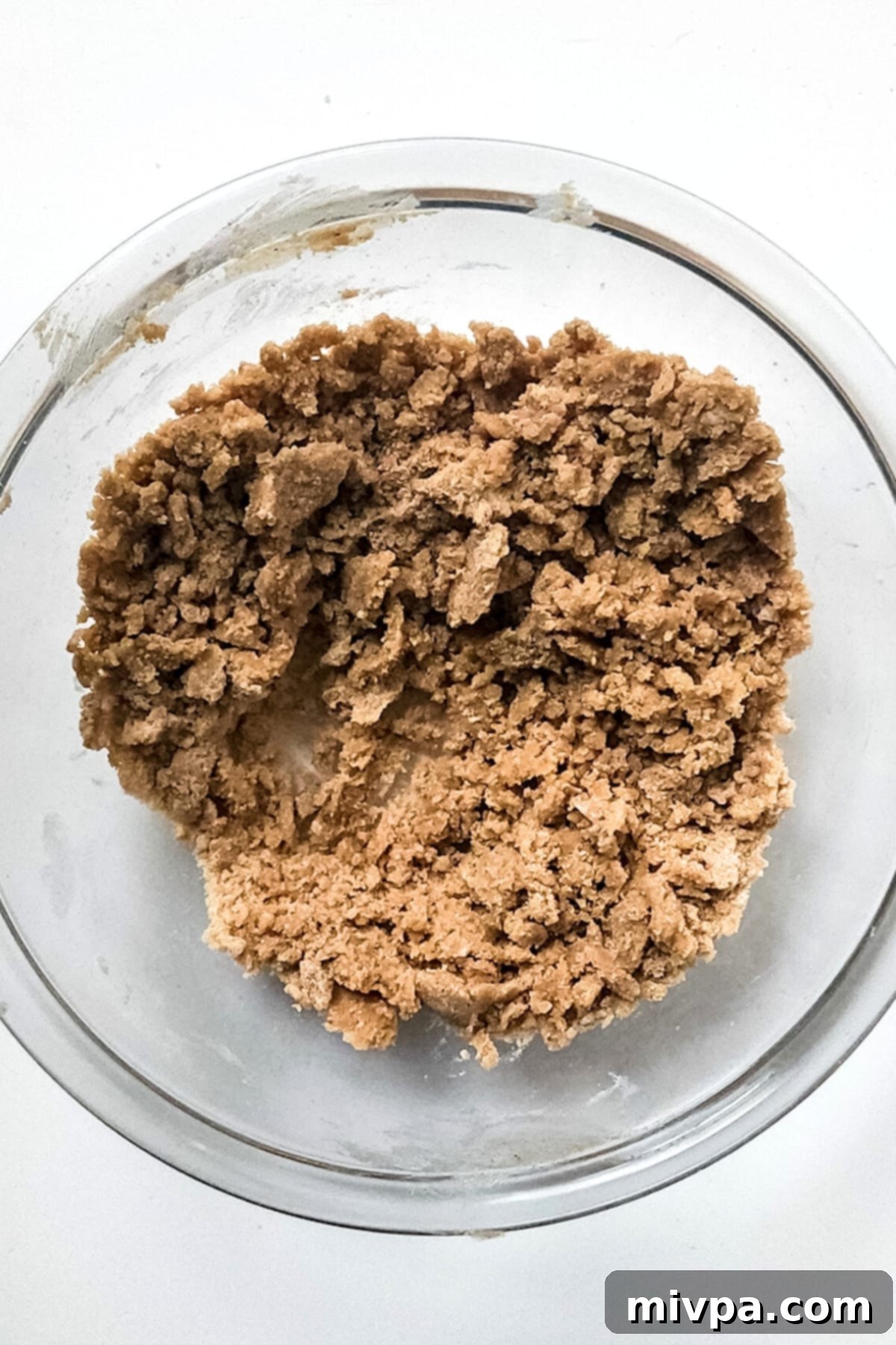 Gluten-Free Vegan Apple Bread Crumble mixture in a bowl, showing the perfect crumbly texture.