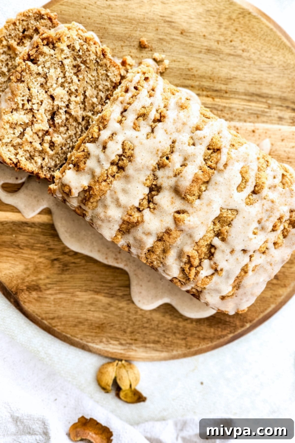 Gluten-Free Dairy-Free Apple Bread Top-down view of a freshly sliced gluten-free vegan apple bread loaf.