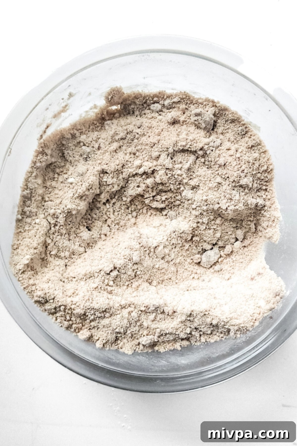 Flour mixture in glass bowl. Flour mixture in a glass bowl, after all dry ingredients have been combined.