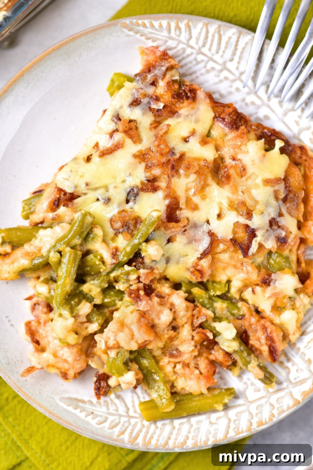 Top down view of gluten-free dairy-free green bean casserole on plate.